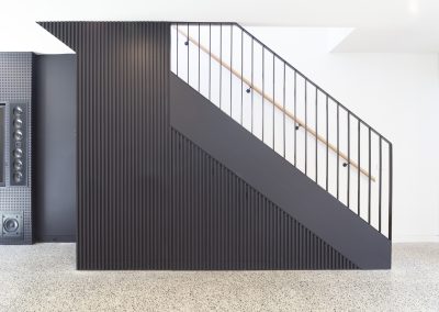 Charlotte-St-Richmond-discreet-storage-under-stairs